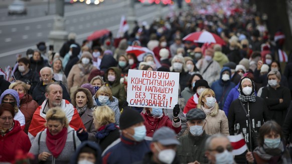 Belarusian pensioners attend an opposition rally to protest the official presidential election results in Minsk, Belarus, Monday, Nov. 2, 2020. Thousands of aged pensioners marched Monday in the capit ...