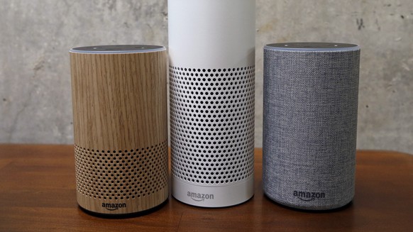 FILE - In this Sept. 27, 2017, file photo, Amazon Echo Plus, center, and other Echo devices sit on display during an event announcing several new Amazon products by the company in Seattle. Amazon says ...