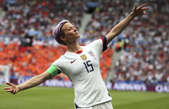 FILE - In this Sunday July 7, 2019 file photo, United States&#039; Megan Rapinoe celebrates after scoring the opening goal from the penalty spot during the Women&#039;s World Cup final soccer match be ...