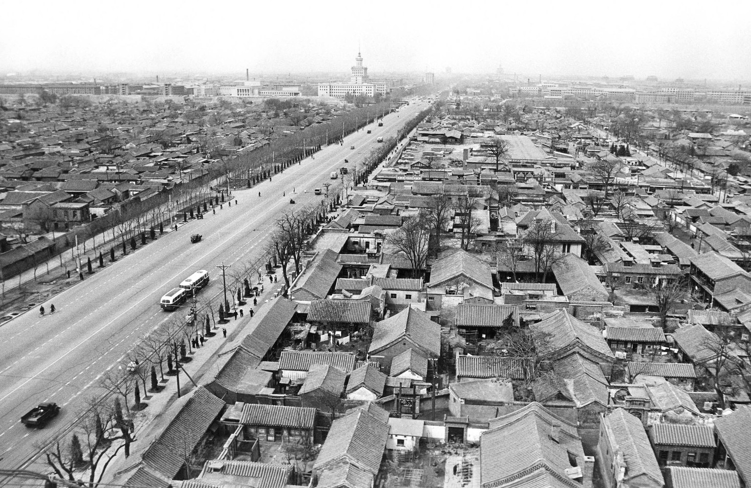 Main Street in Peking (Beijing) with older type housing estates on the right. Note absence of traffic, May 11, 1966. (AP Photo)