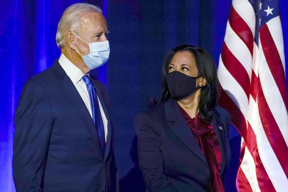 FILE - In this Nov. 6, 2020, file photo then-Democratic presidential candidate former Vice President Joe Biden arrives with his running mate Sen. Kamala Harris, D-Calif., to speak in Wilmington, Del.  ...
