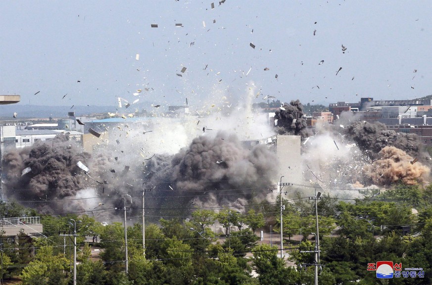 This photo provided by the North Korean government shows the explosion of an inter-Korean liaison office building in Kaesong, North Korea, Tuesday, June 16, 2020. South Korea says that North Korea has ...