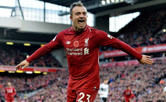 epa07158234 Liverpool&#039;s Xherdan Shaqiri celebrates scoring the second goal making the score 2-0 during the English Premier League soccer match between Liverpool and Fulham at the Anfield in Liver ...