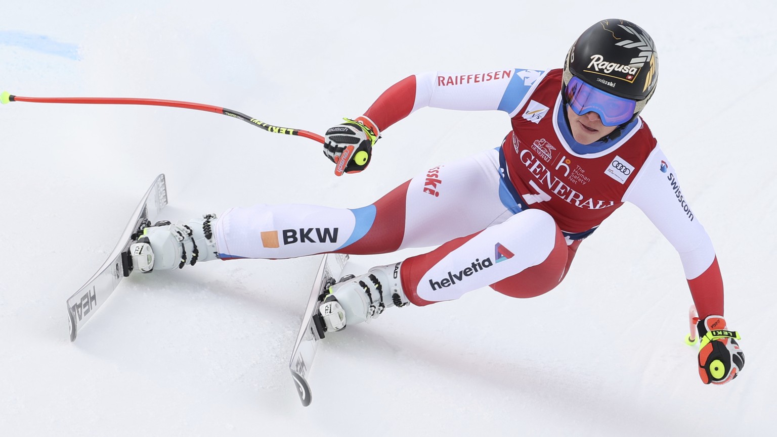 Switzerland&#039;s Lara Gut-Behrami speeds down the slope during an alpine ski, women&#039;s World Cup downhill, in Val di Fassa, Italy, Saturday, Feb. 27, 2021. (AP Photo/Alessandro Trovati)