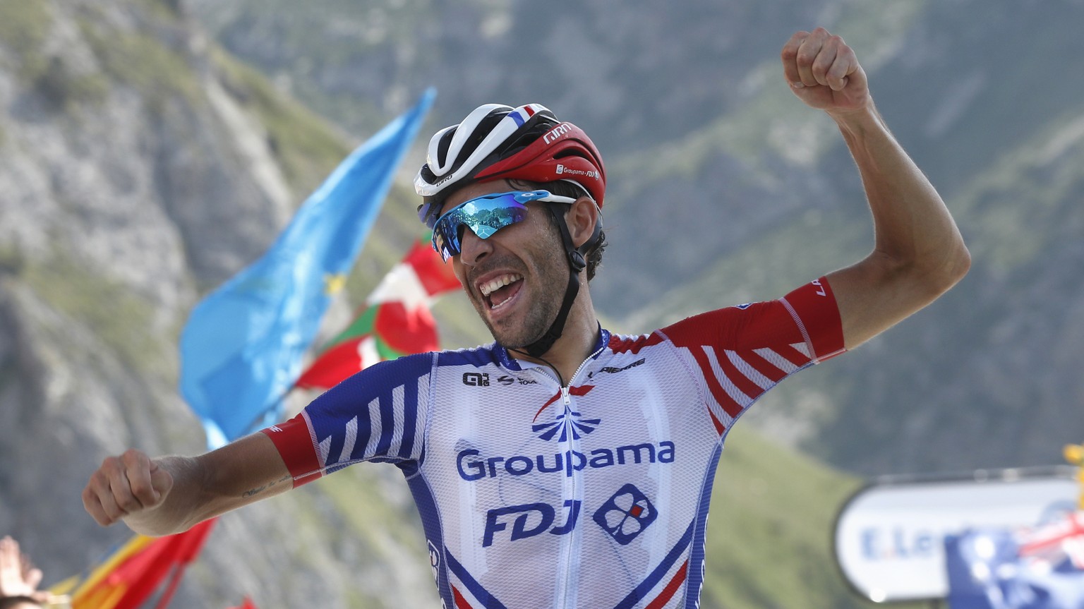 France&#039;s Thibaut Pinot celebrates as he crosses the finish line to win the fourteenth stage of the Tour de France cycling race over 117.5 kilometers (73 miles) with start in Tarbes and finish at  ...