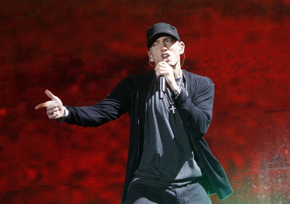 FILE - In this Sept. 13, 2010 file photo, rapper Eminem performs at Yankee Stadium in New York. (AP Photo/Jason DeCrow, file)