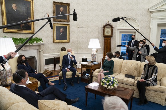 President Joe Biden meets Republican lawmakers to discuss a coronavirus relief package, in the Oval Office of the White House, Monday, Feb. 1, 2021, in Washington. From left, Sen. Mitt Romney, R-Utah, ...