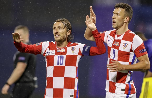 epa08736128 Croatia&#039;s Luka Modric (L) and Croatia&#039;s Ivan Perisic (R) celebrate the team&#039;s 1-0 goal during the UEFA Nations League group A3 soccer match between Croatia and Sweden in Spl ...