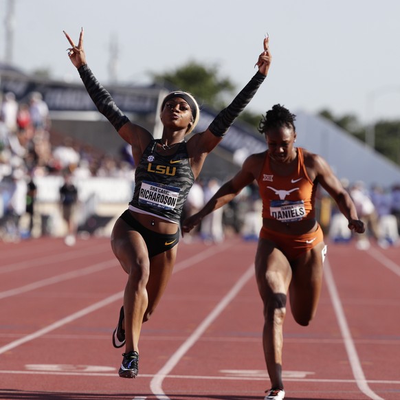LSU&#039;s Sha&#039;Carri Richardson, center, celebrates as she wins the women&#039;s 100 meters during the NCAA outdoor track and field championships in Austin, Texas, Saturday, June 8, 2019. (AP Pho ...