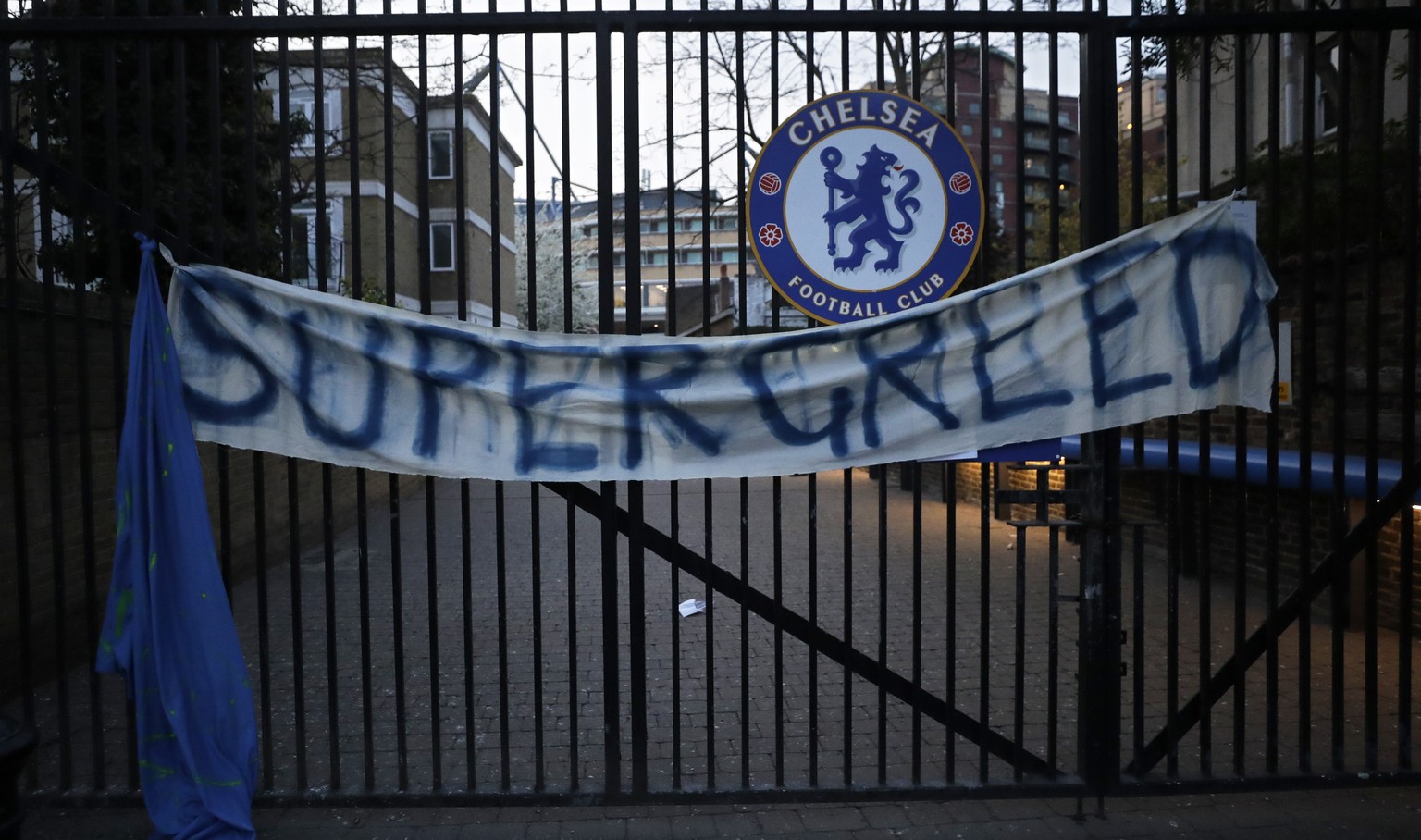 A banner hangs from one of the gates of Stamford Bridge stadium in London where Chelsea fans were protesting against Chelsea&#039;s decision to be included amongst the clubs attempting to form a new E ...