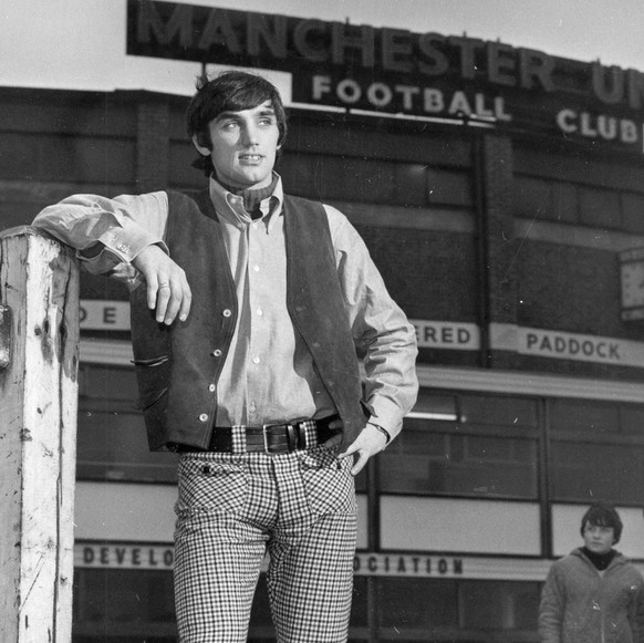 Manchester United and Northern Ireland soccer player George Best stands outside Old Trafford soccer stadium in Manchester, England in this Dec.23, 1965 photo. Best, the dazzling soccer icon of the 196 ...