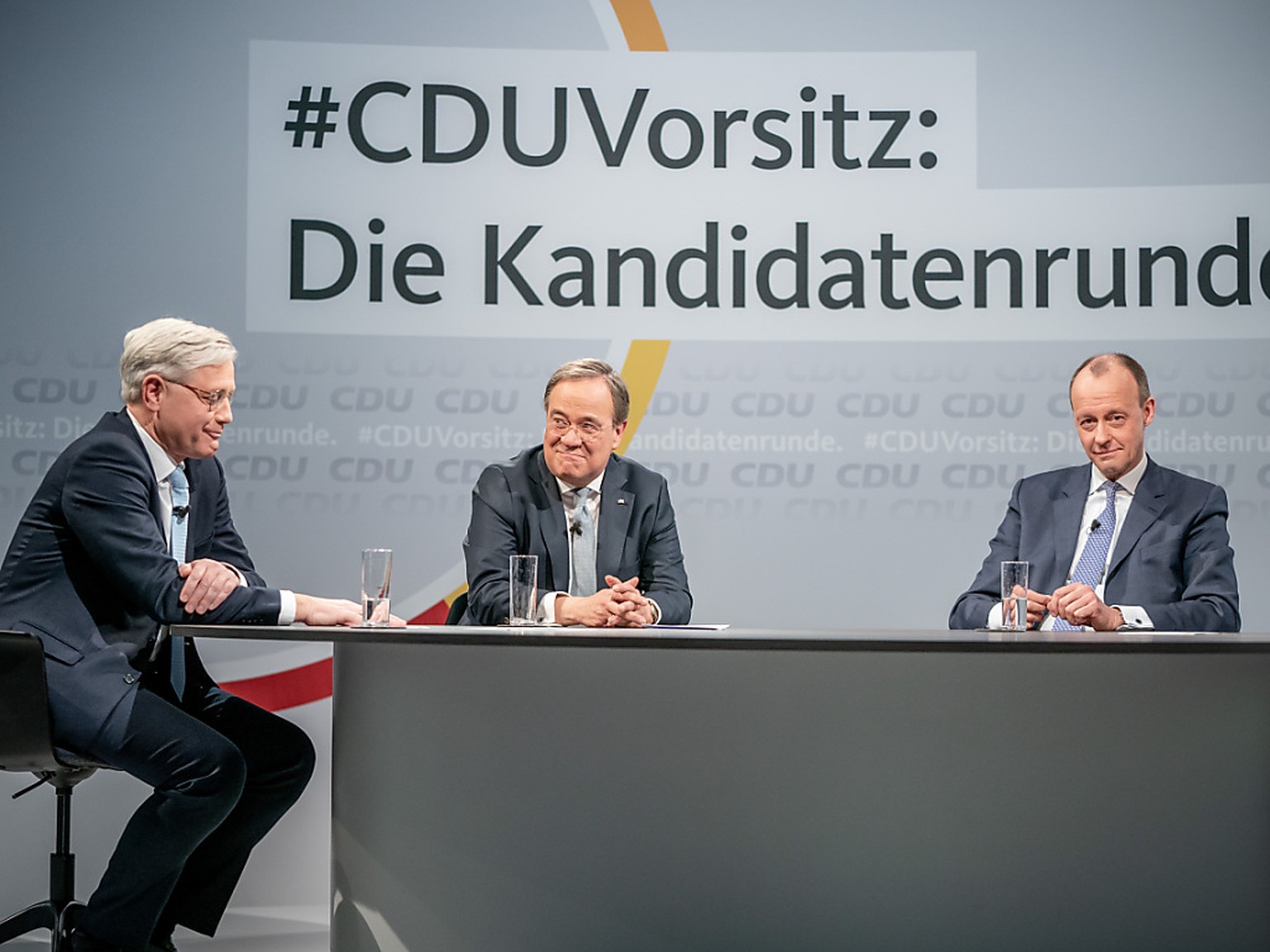 Die drei Kandidaten für den CDU-Parteivorsitz, Friedrich Merz (r-l), Armin Laschet und Norbert Röttgen. Foto: Michael Kappeler/dpa