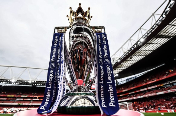 epa08383700 (FILE) - The English Premier League Trophy on display ahead of the English Premier League soccer match between Arsenal and Leicester in London, Britain, 11 August 2017 (re-issued on 25 Apr ...
