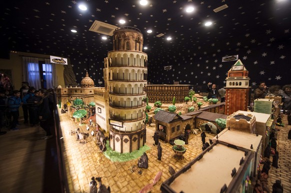 epa05673949 A view of the Leaning Tower of Pisa made with chocolate as part of the Nativity Scene sculpted by Galleros Artesanos de Rute pastry masters, in Rute, Cordoba, Andalusia, Spain, 13 December ...