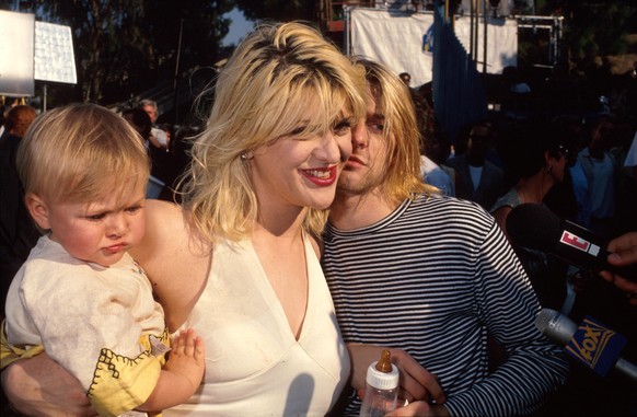 Married singers Courtney Love and Kurt Cobain w. their daughter Frances Bean. (Photo by Time Life Pictures/DMI/The LIFE Picture Collection via Getty Images)