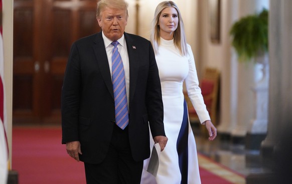 epa08511334 US President Donald J. Trump (L) and Ivanka Trump, Advisor to the President arrive to the American Workforce Policy Advisory Board Meeting at the White House, in Washington, DC, USA, 26 Ju ...
