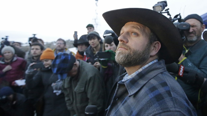 Ammon Bundy, one of the sons of Nevada rancher Cliven Bundy, speaks to reporters during a news conference at Malheur National Wildlife Refuge after meeting with Harney County Sheriff David Ward, Thurs ...