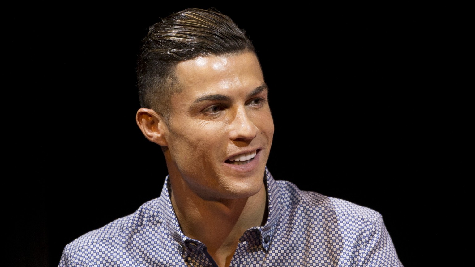 FILE - In this Monday, July 29, 2019 file photo Juventus soccer player Cristiano Ronaldo speaks in Madrid, Spain. Ronaldo&#039;s lawyers have filed public court documents following a judge&#039;s deci ...