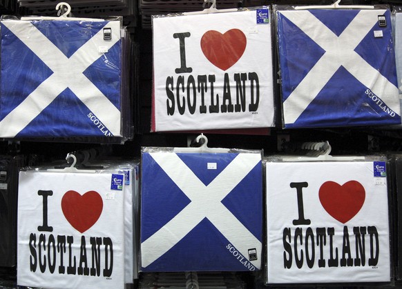 A display of t-shirts are seen for sale in a Scottish memorabilia shop in Edinburgh, Scotland Friday, Jan. 13, 2012. This week Scottish authorities announced they will hold a referendum on independenc ...