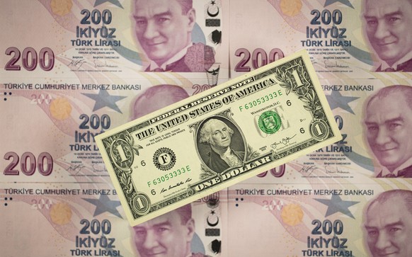 epa08703884 A generic illustration shows Turkish Lira banknotes and a US Dollar banknote in Istanbul, Turkey, 28 September 2020. Turkish Lira hit record low against major currencies, recording 7.83 li ...
