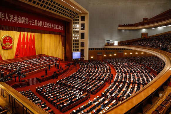 epa07438467 Delegates attend the closing of the second session of the 13th National People&#039;s Congress (NPC) at the Great Hall of the People in Beijing, China, 15 March 2019. The NPC has over 3,00 ...