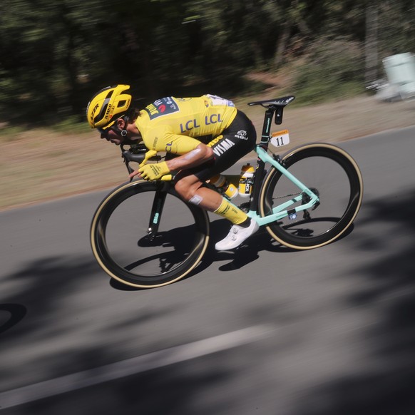 Slovenia&#039;s Primoz Roglic, wearing the overall leader&#039;s yellow jersey, rides during the tenth stage of the Tour de France cycling race over 168.5 kilometers (104.7 miles) from Ile d&#039;Oler ...