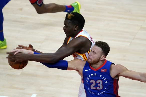 Detroit Pistons forward Blake Griffin (23) and Atlanta Hawks center Clint Capela vie for control of the ball during the second half of an NBA basketball game Wednesday, Jan. 20, 2021, in Atlanta. (AP  ...