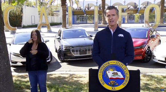 This screen shot from pool video shows California Gov. Gavin Newsom announcing Wednesday, Sept. 23, 2020 that the state will halt sales of new gasoline-powered passenger cars and trucks by 2035, in Sa ...
