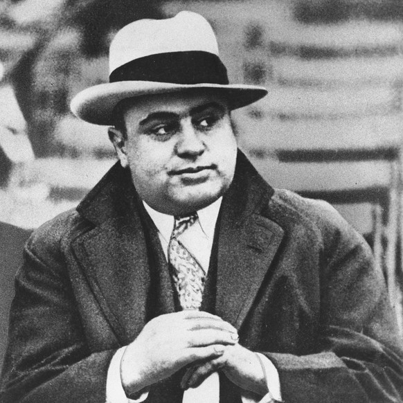 FILE - In this Jan. 19, 1931 file photo, Chicago mobster Al Capone attends a football game in Chicago. On Thursday, Feb. 14, 2013, the Chicago Crime Commission and the Drug Enforcement Administration  ...
