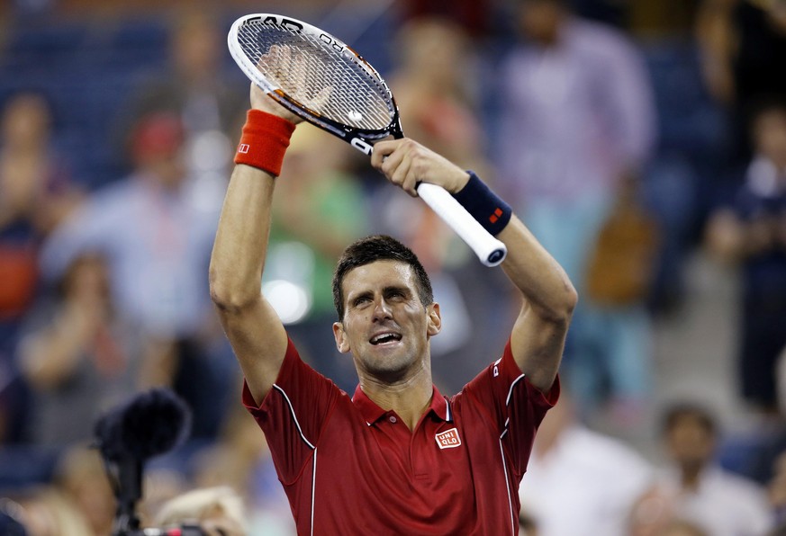 Novak Djokovic of Serbia celebrates his win over Diego Schwartzman of Argentina during their match at the 2014 U.S. Open tennis tournament in New York August 25, 2014.
REUTERS/Shannon Stapleton (UNITE ...