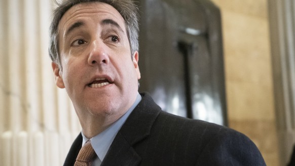 FILE - In this March 6, 2019 file photo, Michael Cohen, President Donald Trump&#039;s former lawyer, returns to testify on Capitol Hill in Washington. Michael Cohen&#039;s tell-all memoir makes the ca ...