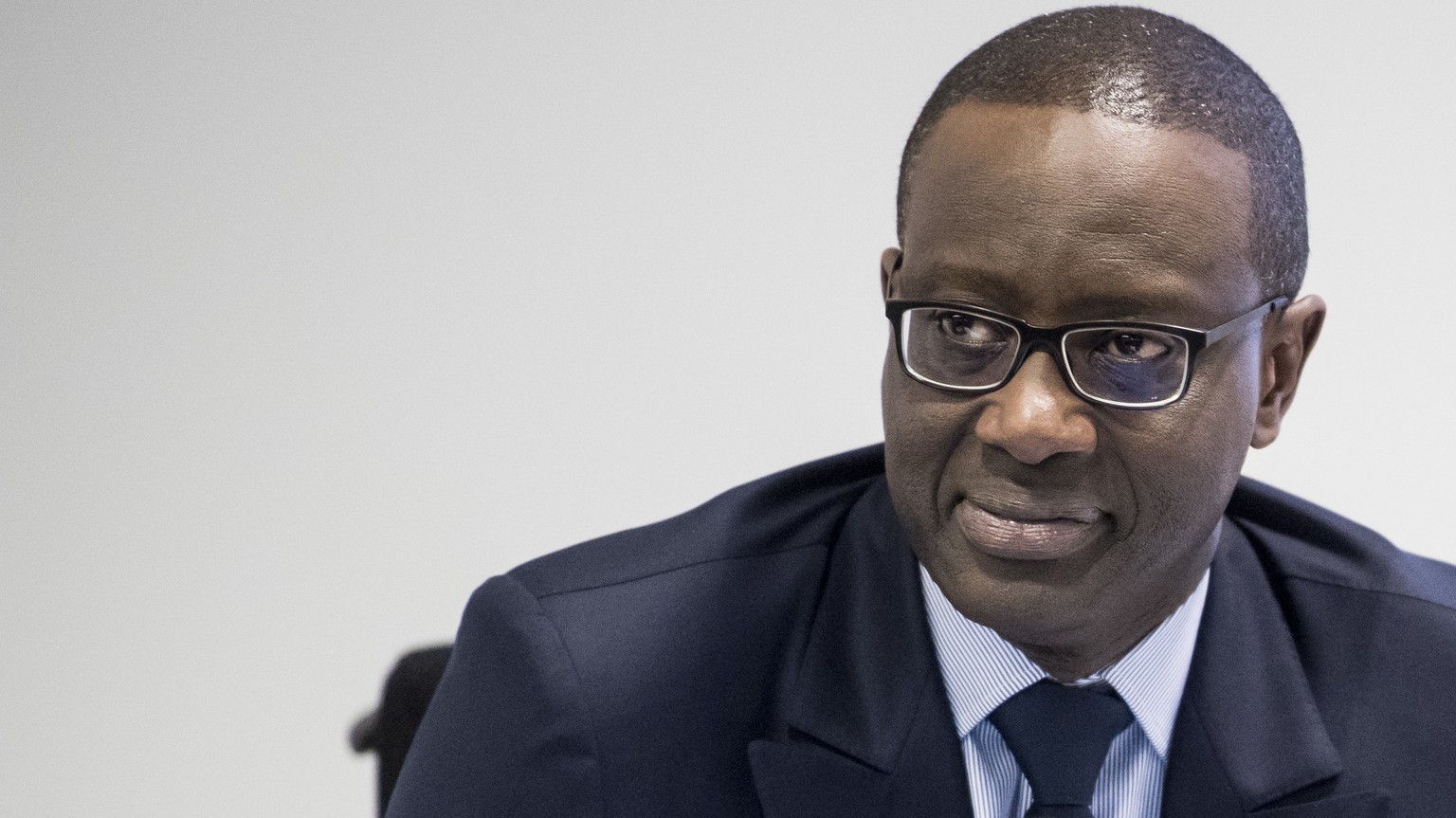 Tidjane Thiam, CEO of Swiss bank Credit Suisse, smiles prior to the press conference of the full-year results of 2017 in Zurich, Switzerland, Wednesday, Feb. 14, 2018. (Ennio Leanza/Keystone via AP)