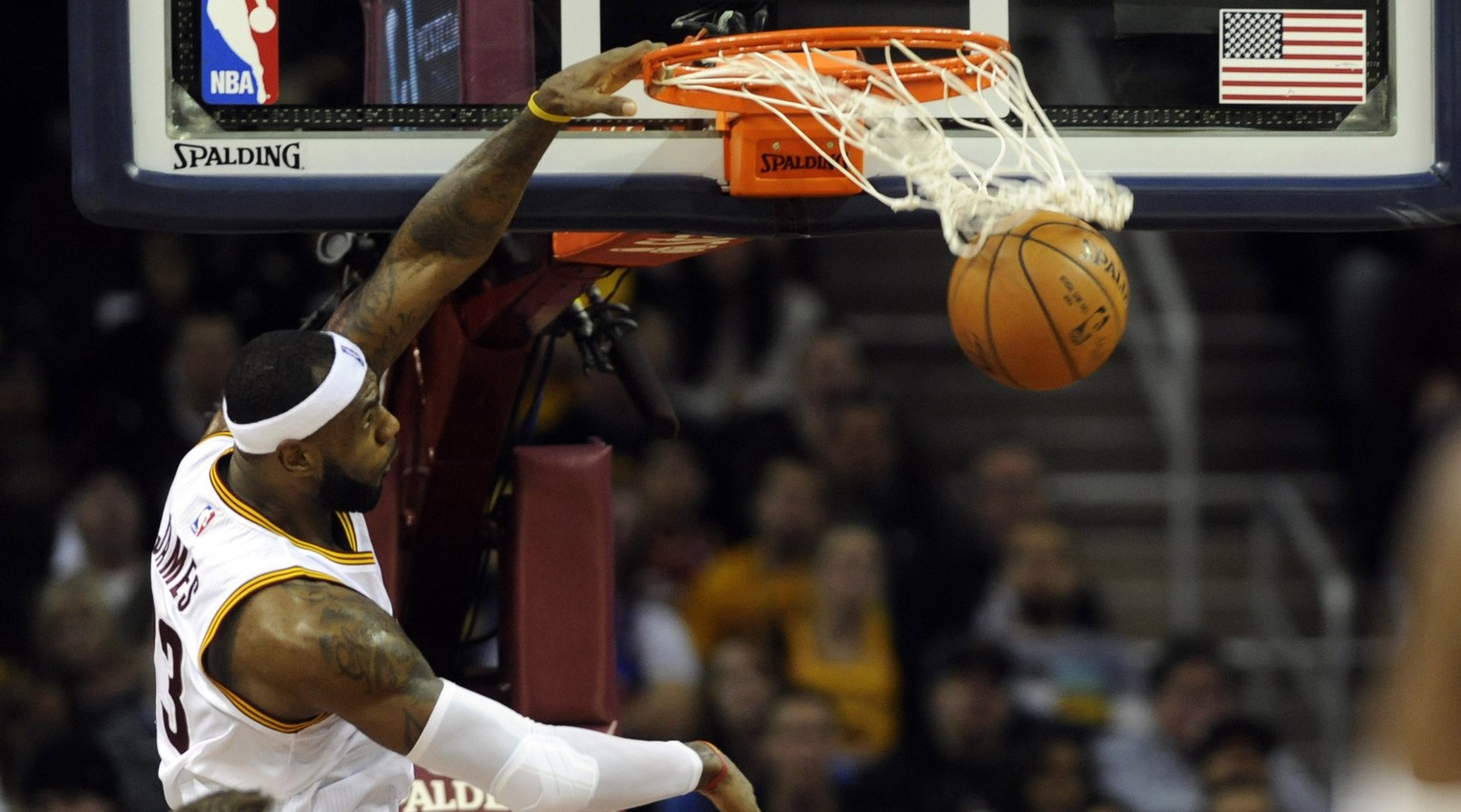Dec 19, 2014; Cleveland, OH, USA; Cleveland Cavaliers forward LeBron James (23) slam dunks during the second quarter against the Brooklyn Nets at Quicken Loans Arena. Mandatory Credit: Ken Blaze-USA T ...