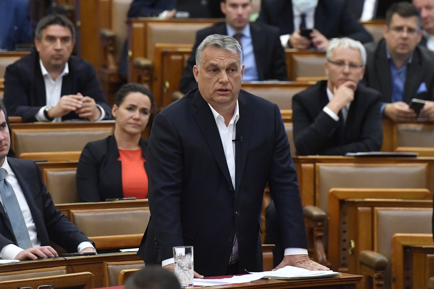 Hungarian Prime Minister Viktor Orban replies to an oppositional MP during a question and answer session of the Parliament in Budapest, Hungary, Budapest, Hungary, Monday, March 30, 2020. Hungary&#039 ...
