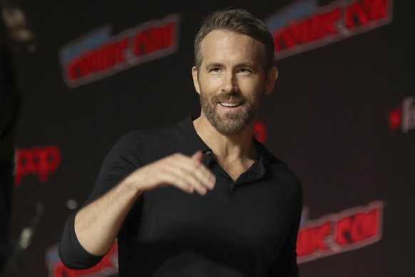 FILE - This Oct. 3, 2019 file photo shows Ryan Reynolds at New York Comic Con. Stay-at-home orders, traveling fears and the cancellation of sporting events, concerts and theme parks have forced the Ma ...