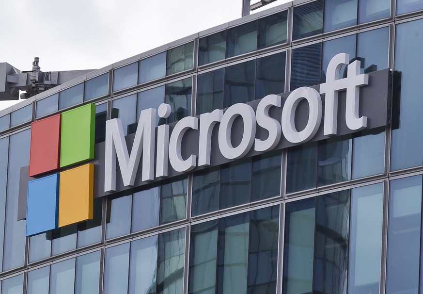 FILE - This April 12, 2016 file photo shows the Microsoft logo in Issy-les-Moulineaux, outside Paris, France. Ongoing demand for Microsoft&#039;s cloud computing services help softened the blow of the ...