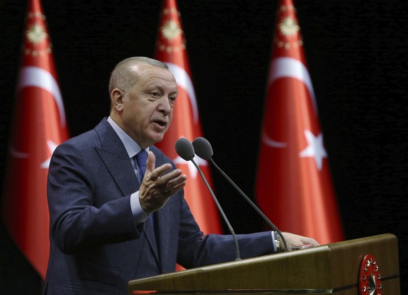 Turkey&#039;s President Recep Tayyip Erdogan speaks during a meeting in Ankara, Turkey, Tuesday, Feb. 11, 2020. Erdogan on Tuesday warned the Syrian government that it will &quot;pay a very, very heav ...