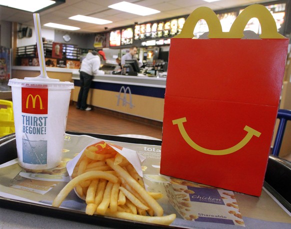 FILE - This Jan. 20, 2012 file photo shows a Happy Meal with french fries and a drink at a McDonald&#039;s, in Springfield, Ill. McDonalds on Thursday, June 25, 2015 said fewer people are picking sod ...