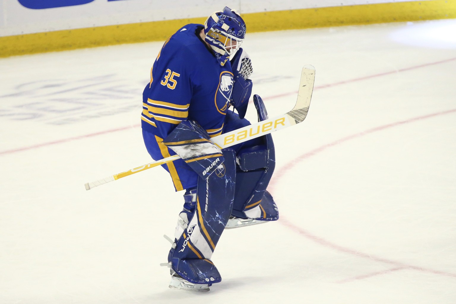 Buffalo Sabres goalie Linus Ullmark (35) celebrates a victory following the shootout of an NHL hockey game against the New York Rangers, Saturday, April 3, 2021, in Buffalo, N.Y. (AP Photo/Jeffrey T.  ...