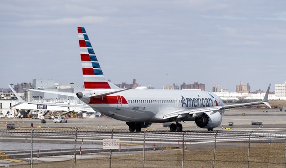 epa07432160 An American Airlines Boeing 737 Max 8 (Tail Number N350RV) prepares for takeoff at LaGuardia Airport in New York, New York, USA, 12 March 2019. Multiple countries around the world have gro ...