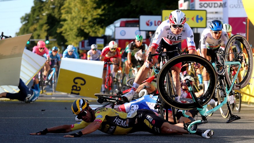 epa08585761 Riders fall near finish line during the 1st stage of Tour de Pologne cycling race, over 195.8 km between Chorzow and Katowice, southern Poland, 05 August 2020. EPA/ANDRZEJ GRYGIEL POLAND O ...
