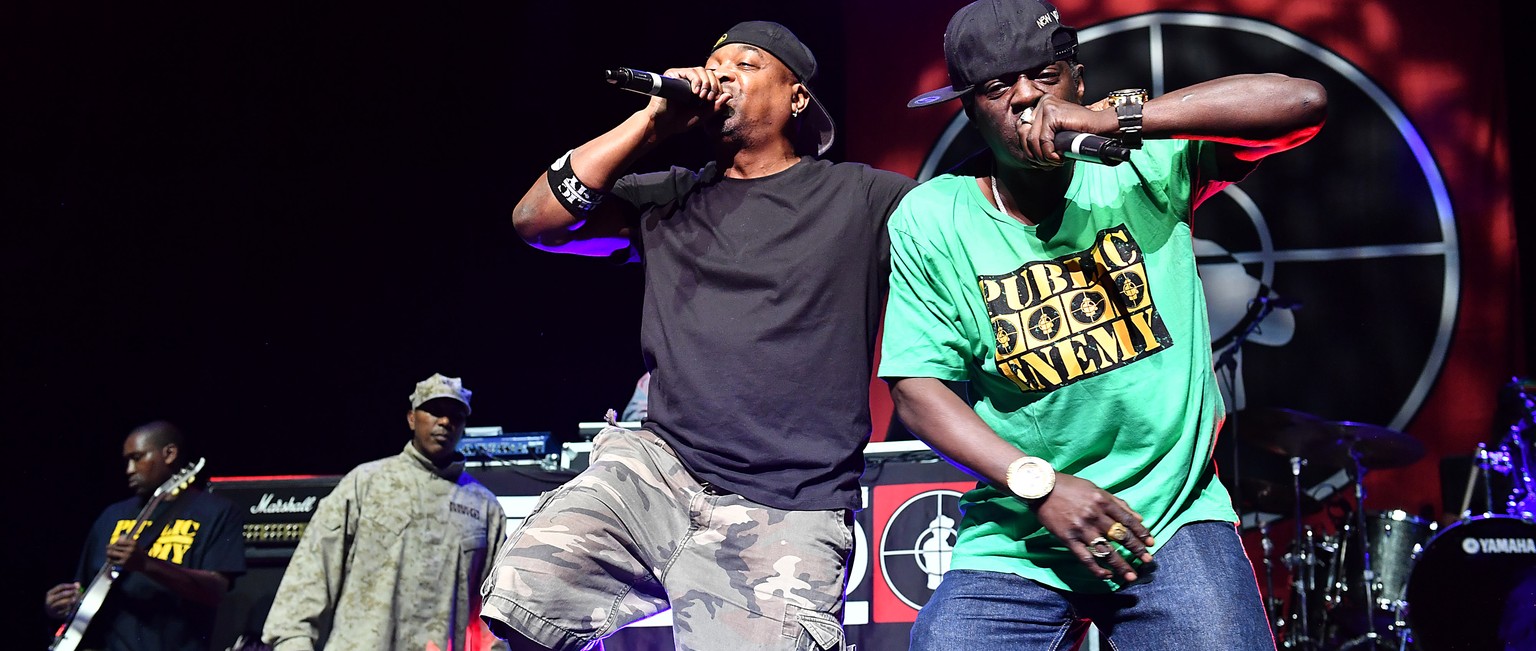 Rappers Flavor Flav, right, and Chuck D of the band Public Enemy perform at the O2 Arena in London, Thursday, June 16, 2016. (Photo by Mark Allan/Invision/AP)