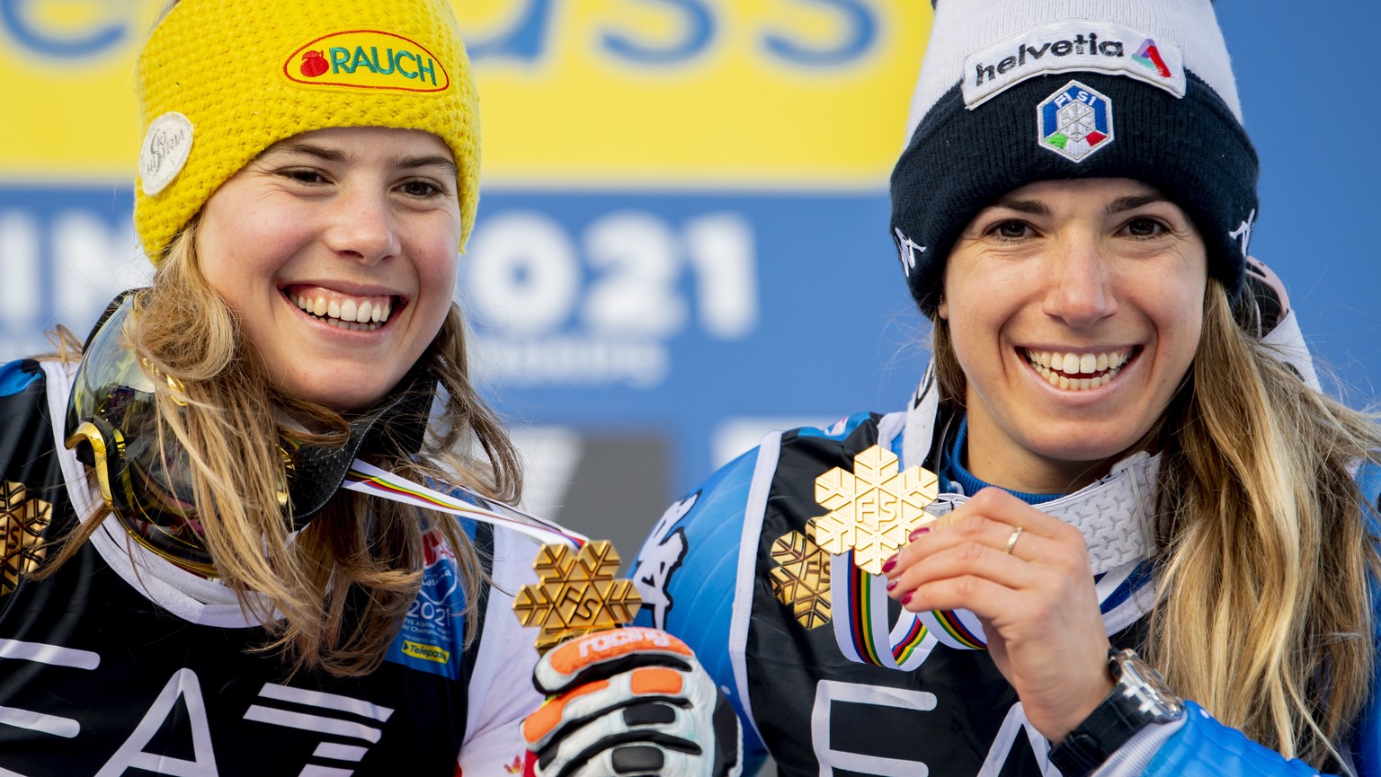 epa09016700 Katharina Liensberger of Austria (L) and Marta Bassino of Italy celebrate the Gold medals for Parallel race during the medals ceremony at the 2021 FIS Alpine Skiing World Championships in  ...