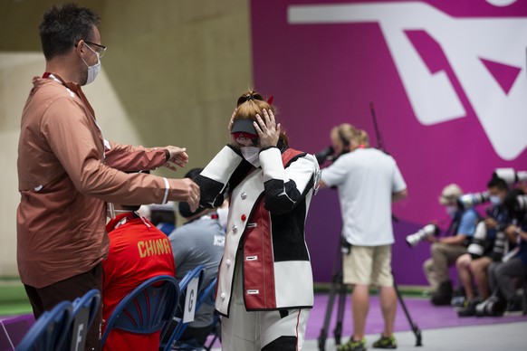 Nina Christen of Switzerland reacts after winning the bronze medal during the women&#039;s shooting 10m air rifle final at the 2020 Tokyo Summer Olympics in Tokyo, Japan, on Saturday, July 24, 2021. ( ...