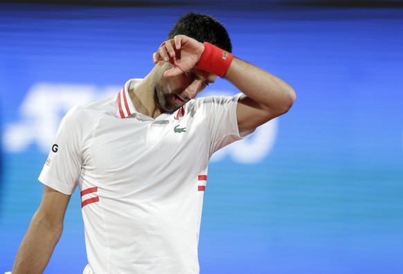 Novak Djokovic of Serbia reacts during the Serbia Open tennis tournament match against Aslan Karatsev of Russia, in Belgrade, Serbia, Saturday, April 24, 2021. (AP Photo/Darko Vojinovic)