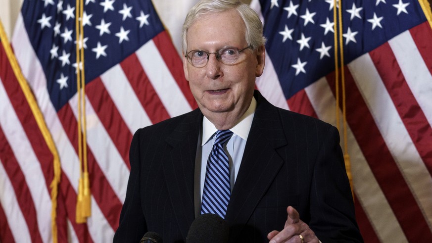 Senate Majority Leader Mitch McConnell, R-Ky., talks briefly to reporters after the Republican Conference held leadership elections, on Capitol Hill in Washington, Tuesday, Nov. 10, 2020. (AP Photo/J. ...