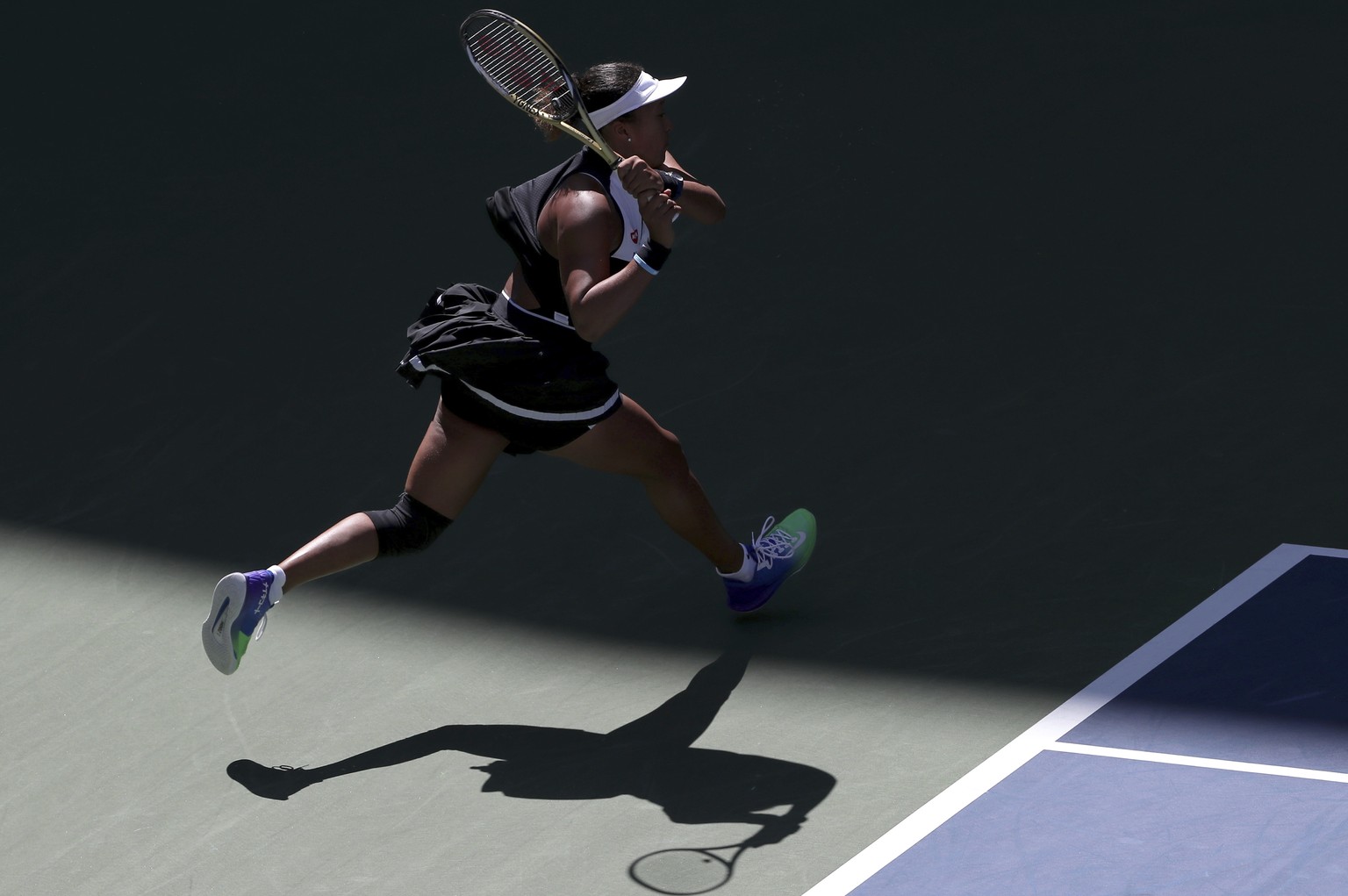 Naomi Osaka, of Japan, returns a shot to Magda Linette, of Poland, during the second round of the US Open tennis championships Thursday, Aug. 29, 2019, in New York. (AP Photo/Eduardo Munoz Alvarez)