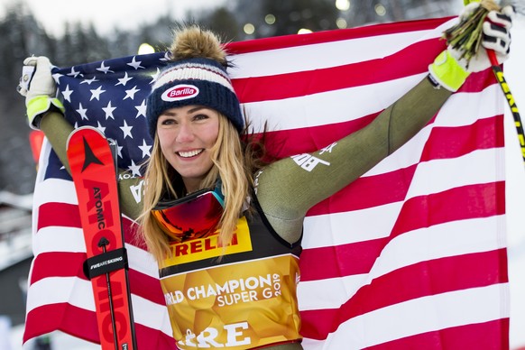 Mikaela Shiffrin of the United States, gold medal, celebrates during the flowers cereemony after the women Super-G race at the 2019 FIS Alpine Skiing World Championships in Are, Sweden Tuesday, Februa ...