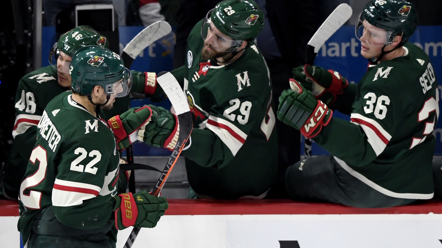 Minnesota Wild&#039;s Jared Spurgeon (46), Greg Pateryn (29) and Nick Seeler (36) congratulate teammate Nino Niederreiter (22), of Switzerland, on his goal against the Florida Panthers during the firs ...