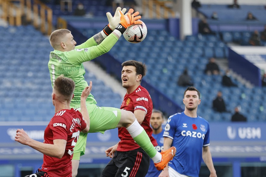 Everton&#039;s goalkeeper Jordan Pickford makes a save during the English Premier League soccer match between Everton and Manchester United at the Goodison Park stadium in Liverpool, England, Saturday ...